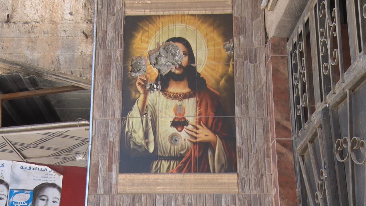 Qaraqosh Jesus Mural Bullet Holes