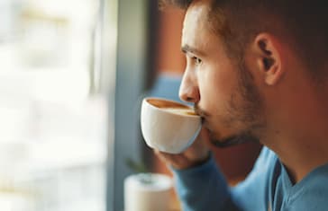 Young man drinking coffee